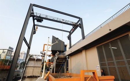 Cargo terminal for loading bulk cargo by ship cranes and grabsの写真素材