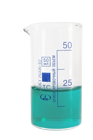 The isolated beaker is on the table on a white backgroundの写真素材