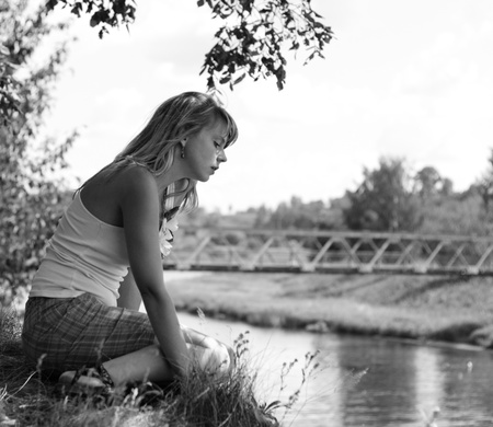 The beautiful girl looking for a river  Sunny Dayの写真素材