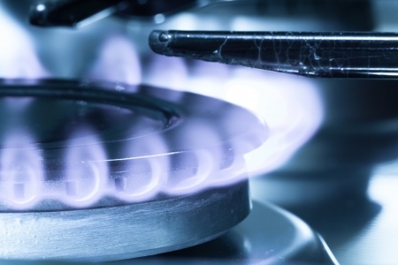 Flames of gas stove close-up shot. Natural gasの写真素材