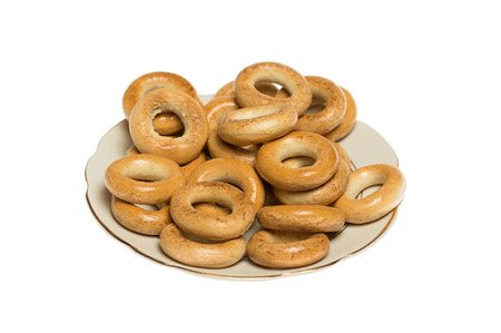 Bagels laid out on a plate, studio shot, isolated on white の写真素材