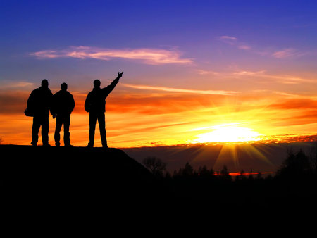 silhouette of man at sunset on hill of stronghold
