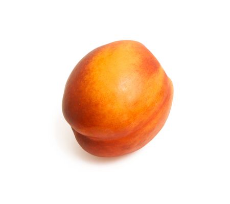 Juicy nectarine on the isolated background with soft shadeの写真素材