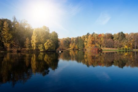 Idyllic  park area near blue lake in springの写真素材