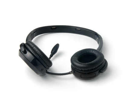Black bluetooth headphones isolated on a white background 