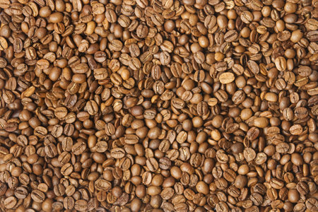 Coloured coffee texture. Coffee beans closeup.