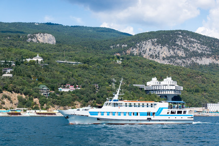 The seascape. Views of the Crimean coastline with hotels and beaches with mountains in the background.のeditorial素材