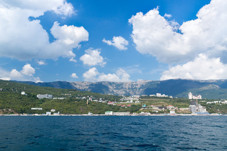 The seascape. Views of the Crimean coastline with hotels and beaches with mountains in the background.の写真素材