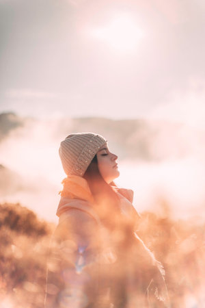 a women with close eyes in the forestの写真素材
