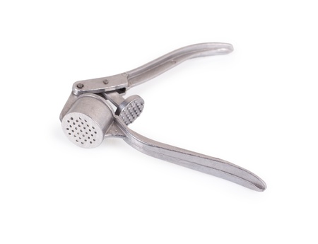 press for garlic on a white background の写真素材