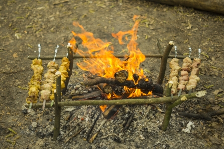 Process of preparation of a shish kebab, from uncooked to the cookedの写真素材