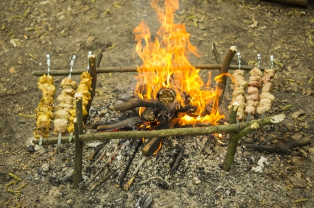 Process of preparation of a shish kebab, from uncooked to the cookedの写真素材