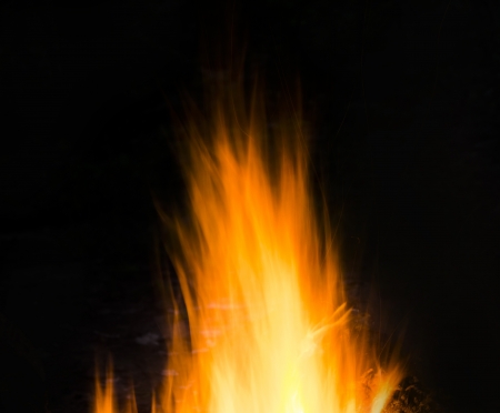 Flames of a campfire in the nightの写真素材