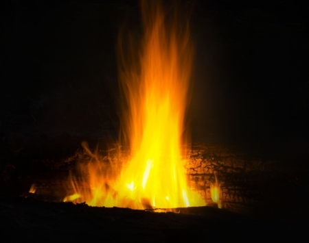Flames of a campfire in the nightの写真素材