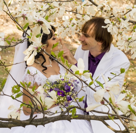 Happy young bride and groom on their wedding dayの写真素材