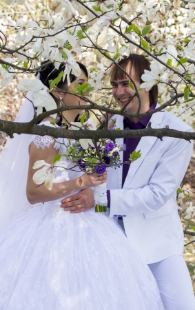 Happy young bride and groom on their wedding dayの写真素材