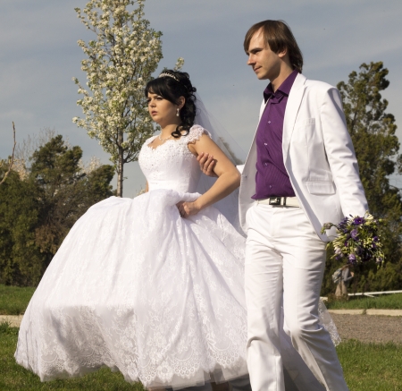 couple in love bride and groom together in wedding summer の写真素材