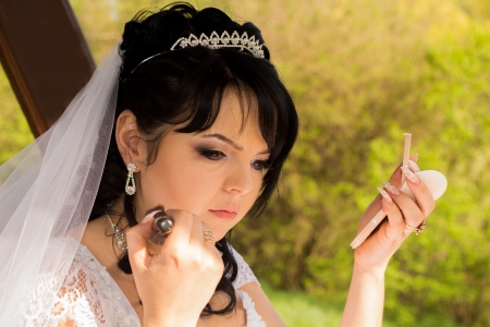 young bride is doing makeupの写真素材