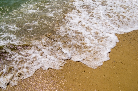 Sand beach and waveの写真素材