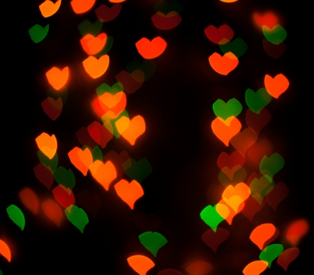 Defocused lights or bokeh in the form of heartの写真素材