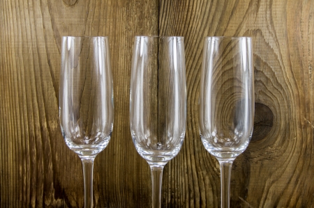  glass with champagne on a wooden backgroundの写真素材