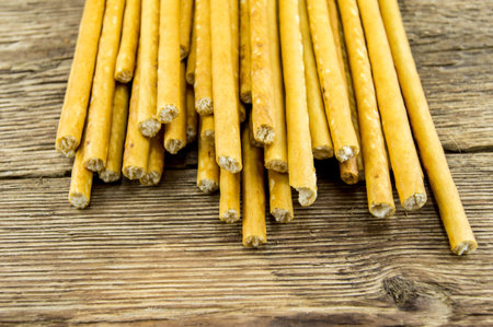 bread sticks on wooden background