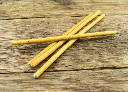 bread sticks on wooden backgroundの写真素材