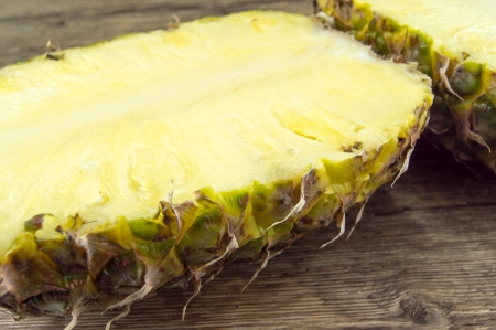 pineapple sliced ââon a wooden backgroundの写真素材