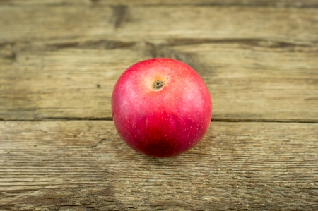 Apple on wooden backgroundの写真素材