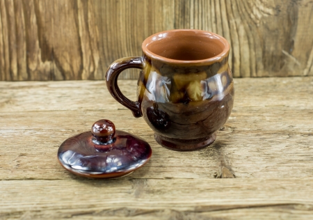 closeup of cup with tea in asian style on wooden desk and wooden backgroundの写真素材