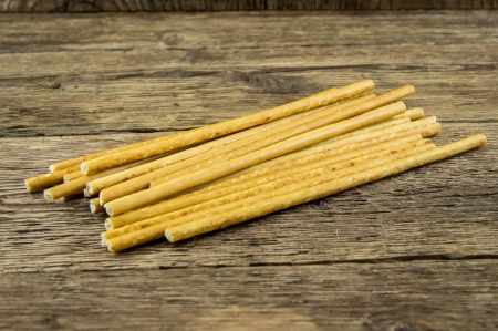 bread sticks on wooden backgroundの写真素材