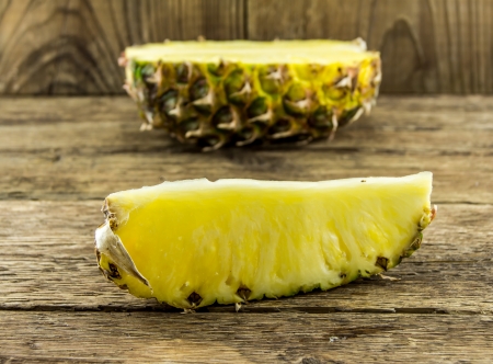 pineapple sliced ââon a wooden backgroundの写真素材