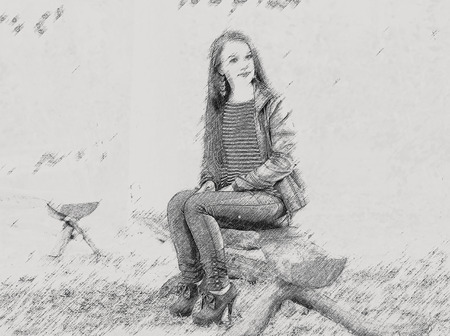 Young beautiful student brunette sitting on a bench. effect pencilの写真素材
