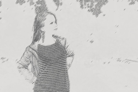 Young pretty woman in park. Effect pencilの写真素材