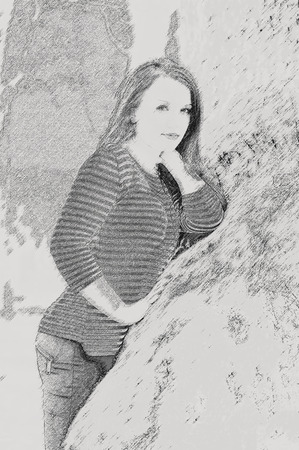 Young pretty woman in park. Effect pencilの写真素材