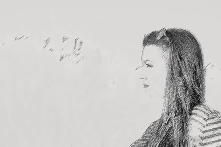 Young pretty woman in park. Effect pencilの写真素材