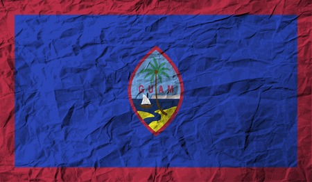 Flag of Guam with old texture. Vector illustrationのイラスト素材