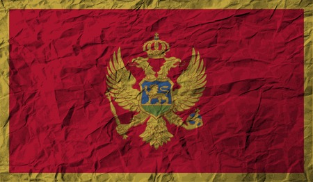 Flag of Montenegro with old texture. Vector illustrationのイラスト素材