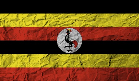 Flag of Uganda with old texture. Vector illustrationのイラスト素材