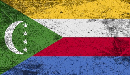 Flag of Comoros with old texture. Vector illustrationのイラスト素材