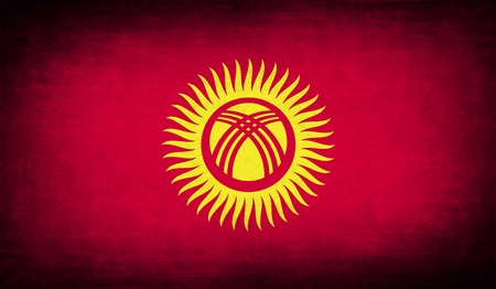 Flag of Kyrgyzstan with old texture. Vector illustrationのイラスト素材