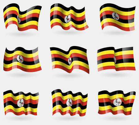Set of Uganda flags in the air. Vector illustrationのイラスト素材