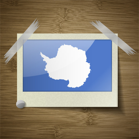 Flags of Antarctica at frame on wooden texture. Vector illustrationのイラスト素材