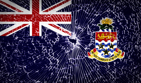 Flags of Cayman Islands with broken glass texture. Vector illustrationのイラスト素材