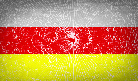Flags of North Ossetia with broken glass texture. Vector illustrationのイラスト素材