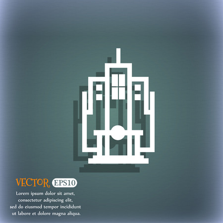 skyscraper icon symbol on the blue-green abstract background with shadow and space for your text. Vector illustrationのイラスト素材