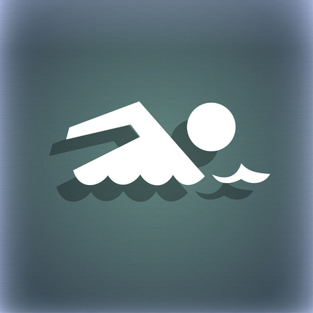 Swimming sign icon. Pool swim symbol. Sea wave. On the blue-green abstract background with shadow and space for your text. illustrationの写真素材