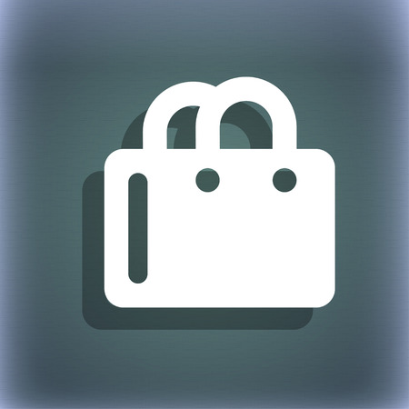 shopping bag icon symbol on the blue-green abstract background with shadow and space for your text. illustrationの写真素材