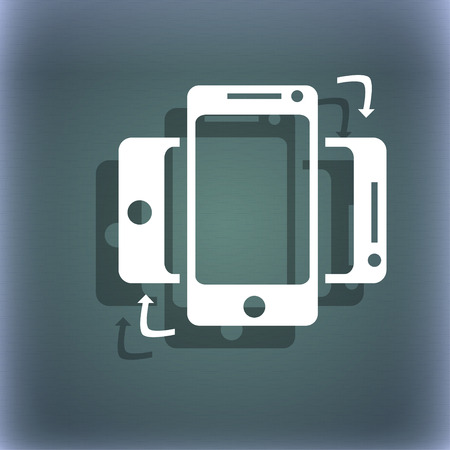 Synchronization sign icon. smartphones sync symbol. Data exchange. On the blue-green abstract background with shadow and space for your text. illustrationの写真素材