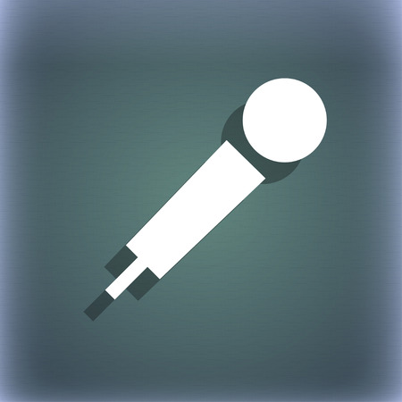 microphone icon symbol on the blue-green abstract background with shadow and space for your text. illustrationの写真素材